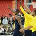 Michigan junior Tim Hardaway Jr. and teammates wave to the crowd to thank them the for their support at the end of an open practice at the Georgia Dome in Atlanta on Friday, April 5, 2015. Melanie Maxwell I AnnArbor.com